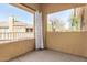 This relaxing patio features a shaded area with an outdoor curtain at 955 E Knox Rd # 224, Chandler, AZ 85225