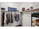 Walk-in closet with organized shelving and hanging storage at 1024 E Frye Rd # 1093, Phoenix, AZ 85048