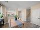 Bright dining room features a wood table, seating for six, and views of the kitchen and staircase at 1024 E Frye Rd # 1093, Phoenix, AZ 85048