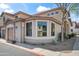 Well-maintained townhome featuring a tile roof, bay windows, and a two-car garage at 1024 E Frye Rd # 1093, Phoenix, AZ 85048