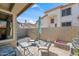 Relaxing outdoor patio with seating, a grill, and a view of the backyard at 1024 E Frye Rd # 1093, Phoenix, AZ 85048