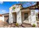 Inviting home showcasing a covered entryway, brick pathway, and well-maintained landscaping for a welcoming entrance at 10320 E Tupelo Ave, Mesa, AZ 85212