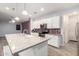 Well-lit kitchen featuring a large island and white cabinetry at 10320 E Tupelo Ave, Mesa, AZ 85212