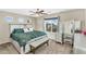 Charming main bedroom features a comfortable bed, a stylish bench, and a matching vanity set at 1061 E Poncho Ln, San Tan Valley, AZ 85143