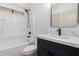 Bathroom features a modern black faucet and showerhead, white countertops, and a bathtub at 1061 S Palo Verde St, Mesa, AZ 85208