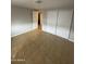 Bedroom featuring tile flooring and a closet with sliding doors at 10955 N 79Th N Ave # 34, Peoria, AZ 85345