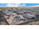 Aerial view of a desert community, showcasing single-Gathering homes and desert landscape at 11366 W Ashby Dr, Peoria, AZ 85383