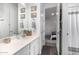 Bathroom features white vanity with a view to bedroom at 11366 W Ashby Dr, Peoria, AZ 85383