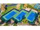 Beautiful overhead shot of pristine tennis courts with green and blue surfaces, perfect for sports enthusiasts at 11366 W Ashby Dr, Peoria, AZ 85383