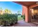 Cozy covered patio providing a serene outdoor space and views of the landscaped backyard at 12212 N Paradise Village S Pkwy # 136, Phoenix, AZ 85032