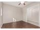 Bedroom with tile flooring, neutral walls, and a ceiling fan at 15480 W Corrine Dr, Surprise, AZ 85379