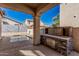 Outdoor kitchen featuring a grill and a swimming pool at 15480 W Corrine Dr, Surprise, AZ 85379