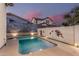 Backyard with a refreshing swimming pool at 15480 W Corrine Dr, Surprise, AZ 85379