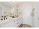 Bathroom boasts dual sinks, modern fixtures, and white cabinets at 1728 E Barbarita Ave, Gilbert, AZ 85234