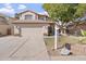 Well-maintained two-story home featuring a large front yard and a spacious two-car garage at 1728 E Barbarita Ave, Gilbert, AZ 85234