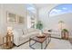 Cozy living room with vaulted ceiling, stylish furnishings, and plenty of natural light at 1728 E Barbarita Ave, Gilbert, AZ 85234