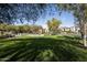 A community park features open green spaces, mature trees, and walking paths for residents' enjoyment at 19978 N 101St Pl, Scottsdale, AZ 85255