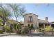 Beautiful two-story home with a stucco exterior, tile roof, and professional landscaping at 19978 N 101St Pl, Scottsdale, AZ 85255