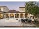 Beautiful outdoor patio with stone tile, mountain views, and an outdoor dining area at 19978 N 101St Pl, Scottsdale, AZ 85255