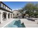 A tranquil pool provides a picturesque backyard oasis, complemented by the home's elegant design at 19978 N 101St Pl, Scottsdale, AZ 85255