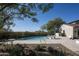 Backyard pool and landscaping view with in-pool loungers, desert foliage, and mountain views at 19978 N 101St Pl, Scottsdale, AZ 85255