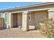 Charming front porch with decorative flowers and accents, enhancing curb appeal at 20231 W Grant St, Buckeye, AZ 85326