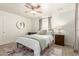 Bedroom with natural light, a ceiling fan, and a calming color palette at 2032 E Harvard St, Phoenix, AZ 85006