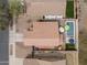 Straight down aerial view of backyard showcasing pool, neighboring houses, and neutral desert landscaping at 22336 E Via Del Palo --, Queen Creek, AZ 85142