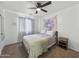 Bedroom with purple tapestry and neutral colored carpet at 22336 E Via Del Palo --, Queen Creek, AZ 85142