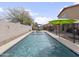 Refreshing backyard pool with fountain features and patio area at 22336 E Via Del Palo --, Queen Creek, AZ 85142