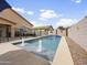 Backyard pool with water features, seating and dining area at 22336 E Via Del Palo --, Queen Creek, AZ 85142