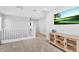 Bright hallway with plush carpet, media center, and recessed lighting at 22484 E Twilight Dr, Queen Creek, AZ 85142
