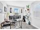Bright office features monitors, plants, and a window letting in natural light for a productive workspace at 22484 E Twilight Dr, Queen Creek, AZ 85142