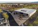 Overhead capture of the Asante Library with parking and recreational areas, set against a backdrop of Arizona landscape at 24117 N 165Th Dr, Surprise, AZ 85387