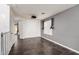 Bonus room with large windows, gray accent wall, and ceiling-mounted projector, perfect for movie nights at 2435 W Via Dona Rd, Phoenix, AZ 85085