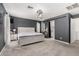 Main bedroom features gray walls, carpet, ceiling fan, and a private ensuite at 2435 W Via Dona Rd, Phoenix, AZ 85085