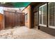 Backyard patio with door and window to the property at 3046 N 32Nd St # 328, Phoenix, AZ 85018