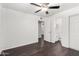 Bedroom featuring hardwood floors, a ceiling fan, neutral paint, with an ensuite bathroom at 3046 N 32Nd St # 328, Phoenix, AZ 85018