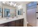 Bathroom featuring a double sink vanity and a separate room for the toilet and shower at 3507 E Jasper Dr, Gilbert, AZ 85296