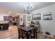 Open dining area connected to the kitchen, featuring a dark wood table and modern decor at 3507 E Jasper Dr, Gilbert, AZ 85296