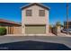 Two-car garage, located on a paved street, provides secure parking at 3507 E Jasper Dr, Gilbert, AZ 85296