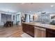 Open-concept kitchen flowing into the dining areas with modern finishes and appliances at 3507 E Jasper Dr, Gilbert, AZ 85296