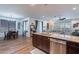 Open-concept kitchen flowing into the living and dining areas with modern finishes at 3507 E Jasper Dr, Gilbert, AZ 85296