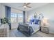 Coastal-themed bedroom with nautical accents, blue and white decor, and natural light at 4077 S Sabrina Dr # 138, Chandler, AZ 85248