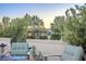 Inviting patio seating area offers views of lush greenery and landscaping at 4077 S Sabrina Dr # 138, Chandler, AZ 85248