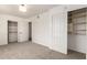 Spacious bedroom featuring dual closets for ample storage space at 458 N Drew W St # West, Mesa, AZ 85201