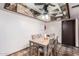 Bright dining room with Saltillo tile flooring, ceiling fan, and dining table at 4721 W Eva St, Glendale, AZ 85302