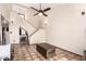 Living room featuring Saltillo tile, a staircase and a coffee table at 4721 W Eva St, Glendale, AZ 85302