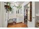 Well-lit bathroom with marble counters and an abundance of plants at 5217 E Tunder Cir, Phoenix, AZ 85044