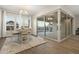 Beautiful dining room with large glass sliding doors opening to the pool and outdoor entertaining area at 5245 N 205Th Ln, Buckeye, AZ 85396